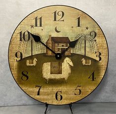 a wooden clock with sheep and barn in the background