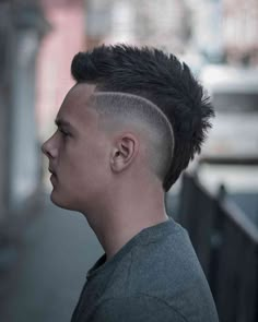 Mohawk Fade With Design, Mohawk Hairstyles Men Short Hair, Mens Burst Fade Mohawk, Mens Haircut Mohawk Fade, Mens Hairstyles Faux Hawk Fade, Skin Fade Mohawk Shaved Sides, Fohawk Haircut Fade Men, Mohawk Men Fade, V Mohawk Men