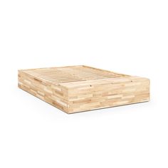 a wooden bed frame sitting on top of a white floor