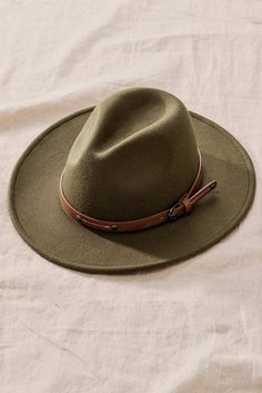 Luxury Bohemian Felt Hat With Flat Brim, Luxury Artisan Natural Color Hats, Olive Green Rancher Hat, Luxury Bohemian Natural Fedora, Luxury Wide Brim Felt Hat For Travel, Luxury Casual Brimmed Felt Hat, Affordable Brimmed Felt Hat For Fall, Luxury Brown Bohemian Felt Hat, Luxury Workout Clothes