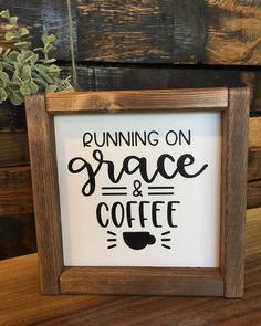 a framed sign that says running on space and coffee