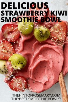 a smoothie bowl with strawberries and kiwis on top