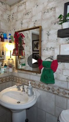 a bathroom with a sink, mirror and shelves filled with bottles on the wall next to it