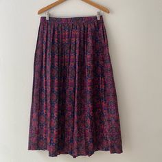 Vintage 80s Portraits By Northern Isles Paisley Retro Maxi Skirt Features: Side Zipper And Button Closure Made In U.S.A. 100% Rayon Size: 16 (Vintage Sizes Tend To Run Small) Approx. Flat Measurements: Waist (One Way): 15.5" Length: 33.25" Make Me An Offer! Bundle With Another Item For Free Shipping Or A Discount! Shop Theyellowsky Closet For: Bohemian Boho Vintage 60s 70s 80s 90s Y2k 1990s 1970s 1980s Cottagecore Hippie Hippy Urban Oversized Western Nwt Fringe Vibrant Patterned Patchwork Office Vintage Multicolor Maxi Skirt For Spring, Hippie Clothes 70s, Vintage Multicolor Long Skirt, Vintage Multicolor Lined Skirt, 1970’s Hippie Skirt, Non-stretch Multicolor Bohemian Maxi Skirt, Trendy Denim, Hippie Outfits, Boho Bohemian