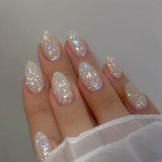 Rounded Glitter Nails, Cute Nail Ideas For Prom, Milky White Sparkly Nails Acrylic, Sparkly Party Nails, Short Oval Glitter Nails, Classy Glam Nails, Pearl Sparkle Nails, Clear Glitter Dip Nails, Almond Nails Designs Sparkle