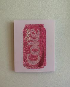 a pink card with the word coke on it