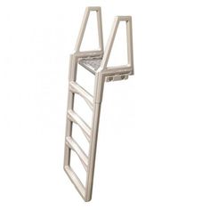 a white ladder that is attached to the side of a wall with an open door