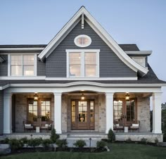 a house with two front doors and windows