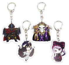 three key chains with anime characters on them