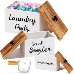 laundry pods and scent booster in wooden boxes