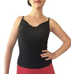 "Classic, all-around cami showcases your fabulous skirts and pants. Draped front and back necklines. Partially lined bodice. 5\" spaghetti straps work with most bras. Item #TL202. Soft, silky and stretchy poly/spandex jersey. Size: -Sizes 4 through 16 Fabric & Care: -Easy care, no-wrinkle poly/spandex -Hand wash cold. Hang dry. Overview: -Great for travel - rolls up small. -Handmade in our studio in Santa Fe, New Mexico USA. Questions about fabric, fit or size? Email me. I am delighted to he Fitted Camisole With Built-in Bra, Fitted V-neck Camisole With Adjustable Straps, Fitted Cami Tank Top With Built-in Bra, Elegant Tank Top With Built-in Bra And Wide Straps, Fitted Camisole With Built-in Bra For Evening, Black Tops With Built-in Bra And Fitted Bodice, Fitted V-neck Top With Lined Body, Bra-friendly Fitted V-neck Tank Top, Elegant Fitted Tank Top With Wide Straps