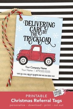 a christmas gift bag with a red truck on it and the words delivering care by the truck