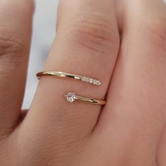 "14k Solid Gold Spiral Diamond Ring, Diamond Wrap Ring, Spiral Ring, Dainty Diamond Ring, Minimalist Ring, Handmade Jewelry Ring features: Metal: Available in solid white, yellow, or rose gold 14k. - Ring Width: Approximately 1.3 mm - Diamond Shape: Round - Number of Stones: Six of Mined Diamond (100% Real Diamonds ) - Diamond Size: 1 Big Diamond = 2.50 mm / 5 Small Diamonds = 1.1 mm - Total CTW: 0.08 Cwt. - Diamond Color-Clarity: G - H Color SI Clarity -Setting Type: Prong + pave Setting ♥ We O Wrap Around Diamond Ring, Gold Ring Dainty, Spiral Gold Ring Designs, 0.5ct Diamond Ring, Rings With Small Stones, Wrap Around Rings, Cute Small Rings, Small Gold Rings, Modern Twist 14k Gold Open Diamond Ring