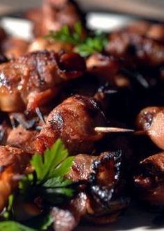 skewers of meat and vegetables on a plate