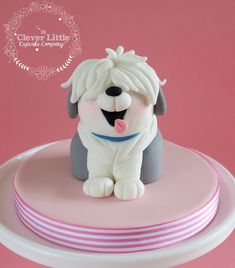 there is a cake that has a dog on it