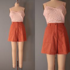 Vintage soft cotton high waisted cargo multipocket shorts in clay orange or terracota color. Made by Jones New York Circa 1990s Fits like medium: 30" waist 38" hips 16" length 13" rise 5.5" inseam Condition: excellent! Vintage Summer Bottoms With Cargo Pockets, Vintage Cargo Bottoms For Summer, Vintage Shorts With Side Pockets For Summer, Orange Shorts With Pockets For Spring, Vintage Cotton Cargo Shorts For Summer, Vintage Summer Cargo Shorts With Pockets, Vintage Summer Shorts With Cargo Pockets, Vintage Cargo Pocket Shorts For Summer, Orange Bottoms With Pockets Short Length