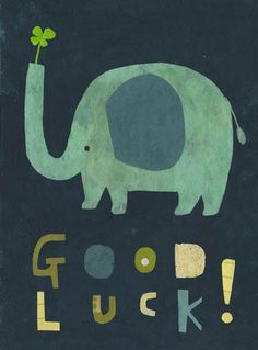 an elephant with a leaf in its trunk and the words good luck written below it