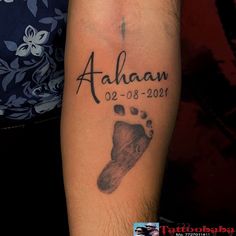 a man with a tattoo on his arm that says, ahanan 02 - 08 - 2011