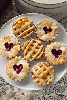 several heart shaped pies on a plate