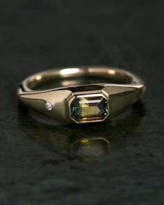 Contemporary ring with emerald cut and brilliant diamond, 14k or 18k yellow gold. Shop bespoke ceremonial, wedding and engagement rings. Man Emerald Ring, Mens Vintage Wedding Ring, Engagement Rings Design Ideas, Emerald Wedding Rings Engagement, Wedding Men Ring, Men Rings Design, Men’s Engagement Ring, Men’s Ring, Men’s Engagement Rings