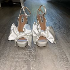 Lively Color: White Satin Size: 6.5 $119.95 Brand New Never Worn Perfect Bridal Shoe Spring Wedding Satin Heels, White Satin Shoes, White Satin Wedding Shoes For Formal Occasions, Spring Wedding Satin Open Toe Shoes, Formal White Satin Wedding Shoes, Party Heels With Satin Bow In White, White Party Heels With Satin Bow, Satin Round Toe Wedding Shoes For Spring, Spring Wedding Shoes With Satin And Round Toe