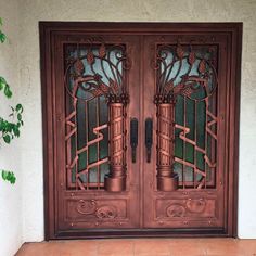 iron double exterior door with square top and kickplate Double Doors Exterior Entrance, Iron Double Door, Diy Fall Wreath Ideas, Double Entry Door, Fall Wreath Ideas, Wrought Iron Entry Doors, Door Grill, Double Doors Exterior, Iron Entry Doors