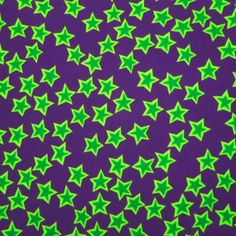 green stars on purple background with space for text