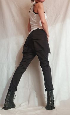 "Extravagant Women Skinny Pants, Outer Pockets Pants ❤️ Extravagant designs and high quality fabrics! ❤️ Materials & Care Textile, Cotton Polyester Hand wash at low temperatures. Do not machine dry. Do not iron. Do not dry clean! ❤️ Sizing We can make your piece from XS to 5XL! Everything in the shop can be also made according to your measures free of charge! ❤️ Shipping ✈ Ready to ship The time I need to prepare an order for shipping varies. For details, see individual items. Priority shipp High Waist Stretch Punk Pants, Punk Stretch Pants For Fall, Punk Style Stretch Pants For Fall, Fall Punk Stretch Pants, Punk Style High Waist Fitted Bottoms, Punk Style Bottoms With Pockets, Alternative Style Stretch Pants For Night Out, Edgy Full-length Leather Pants, Punk Style Full Length Bottoms With Pockets