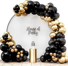 a black and gold balloon arch with the words house of party on it in front of a white background