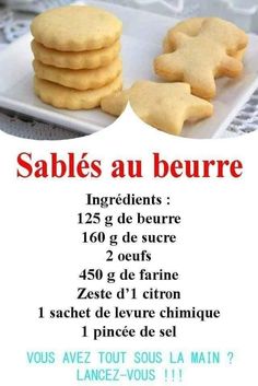 some cookies are on a white plate with words in french and an image of two stars