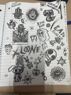 an open notebook with drawings on it and some writing in the middle that says love