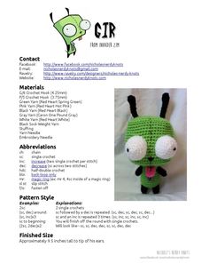 a green crocheted stuffed animal sitting on top of a white sheet with text