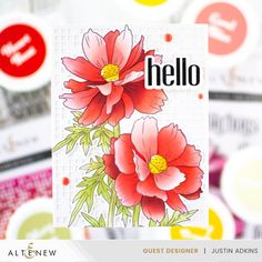 there is a card with flowers on it and the words hello written in black ink