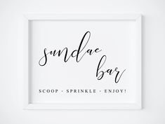 a black and white photo with the words sanddae bar in cursive writing