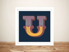 an art print with the letter t on it