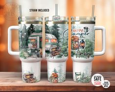 two travel mugs with the words camper and an image of a trailer on them