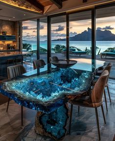 a dining room table with blue glass in the center