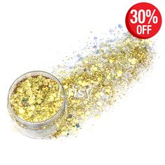 a jar filled with yellow glitter next to a red sale sign that says 30 % off