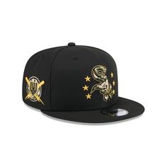 a black hat with gold embroidered on the front, and two crossed swords at the peak