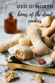 cookies on a table with the words ossi d'morto bones of the island cookies