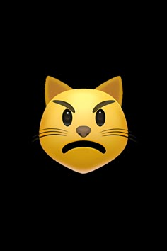 a yellow cat face with an angry look on it's face