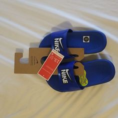 Nike Kid's Kawa Slide Sandals Royal Blue And White. Size 13. Nwt Non-slip Blue Flip Flops For Swimming, Blue Non-slip Open Toe Slippers, Blue Slide Slippers For Spring, Blue Non-slip Slides For Vacation, Blue Non-slip Slide Sandals, Non-slip Blue Slides For Vacation, Blue Slides For Beach, Blue Slide Flip Flops For Beach, Blue Synthetic Slippers For Spring