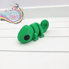 3D Printed Fully Articulated Mini Chameleon Fidget 3d Printed Toys, Printing Companies, Fidget Toys, Split Ring, Intricate Design, Animal Lovers, Showcase Design, Endless Possibilities