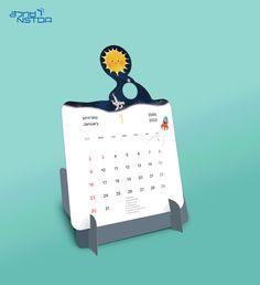 a desk calendar with a cartoon sun on the top, and a pair of scissors sticking out of it