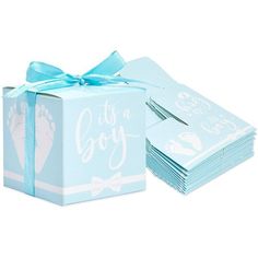 a blue gift box with a bow on the top and it's its a boy written in white