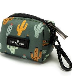 a small zippered pouch with cactus and cacti on it