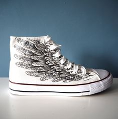 Handpainted Angel Wings Shoes. Acrylic paint on canvas shoes. Every size is possible. I use US size chart! Shoes are hand painted using High grade acrylic paint. I use a special textile paint designed to be flexible on fabric. The paint is water proof and fade proof. Prices depends on what model of shoes you will choose. Let me know the style and your shoe size upon ordering as well as what you want painted on them, and feel free to send me any sketches or ideas you have. Follow me on Facebook: Handpainted Shoes, Art On Shoes, Painting On Shoes Ideas, Sneaker Painting, Shoe Design Ideas, Canvas Shoes Painting, Sneaker Painting Ideas, Drawing On Shoes Ideas, Hand Painted Sneakers