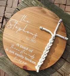 a wooden plaque with a crucifix on it that says, the stephens