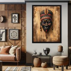 a living room filled with furniture and art on the wall above it is a painting of an african woman's face