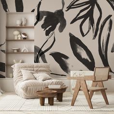 a living room with black and white wallpaper